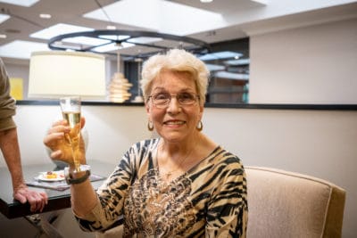 Woman with Champagne toasting