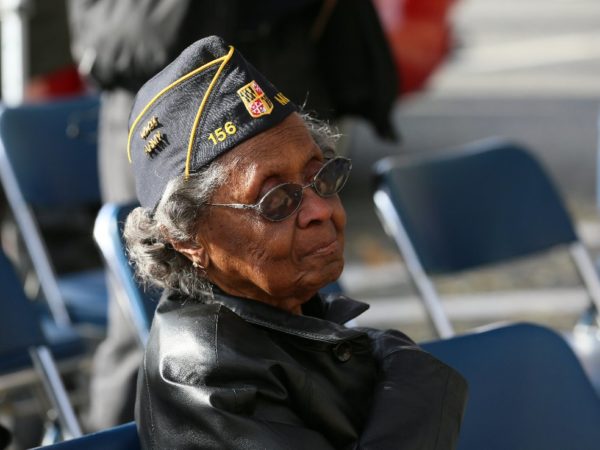 Vivian Bailey African American senior getting an award with a ceramony