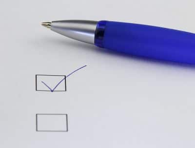 Blue Pen beside checklist