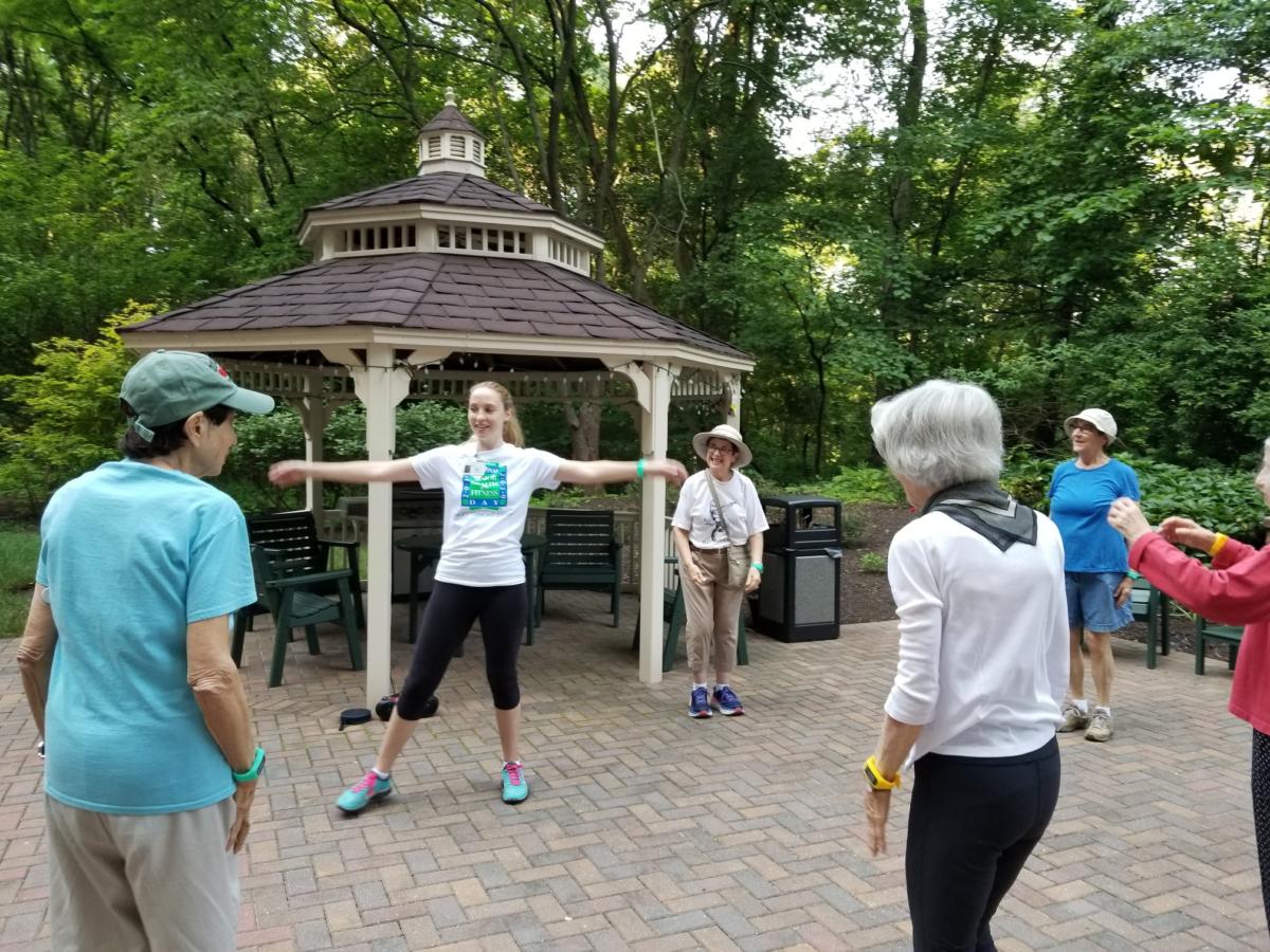 Group of men and women seniors exercising