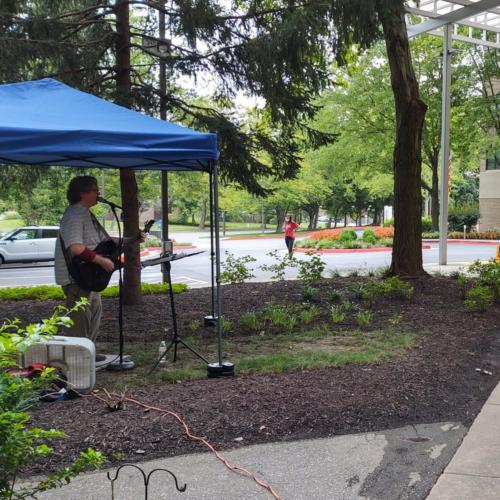 guitarist-under tent