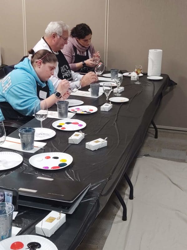 3 painters concentrating